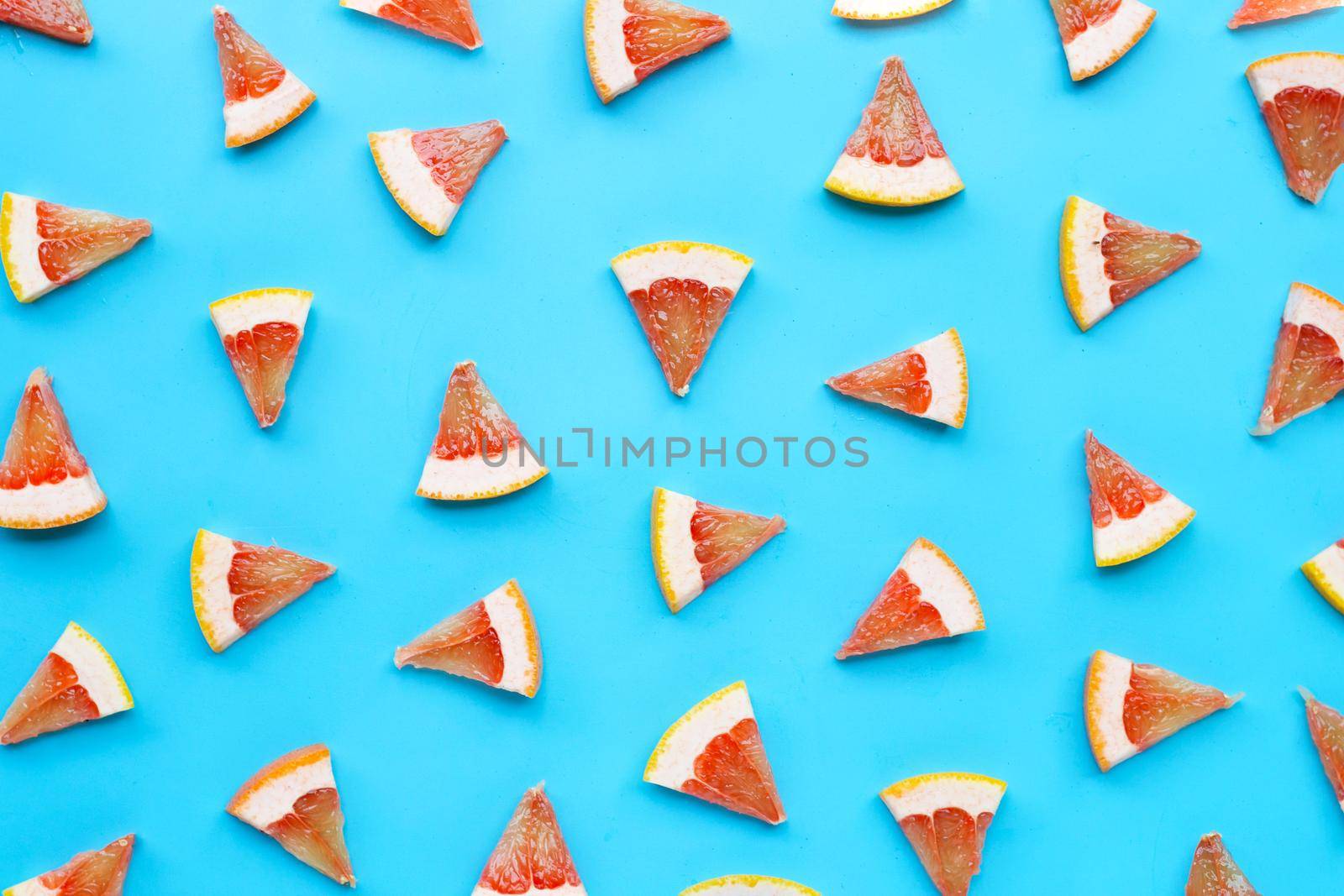 High vitamin C. Juicy grapefruit slices on white background.