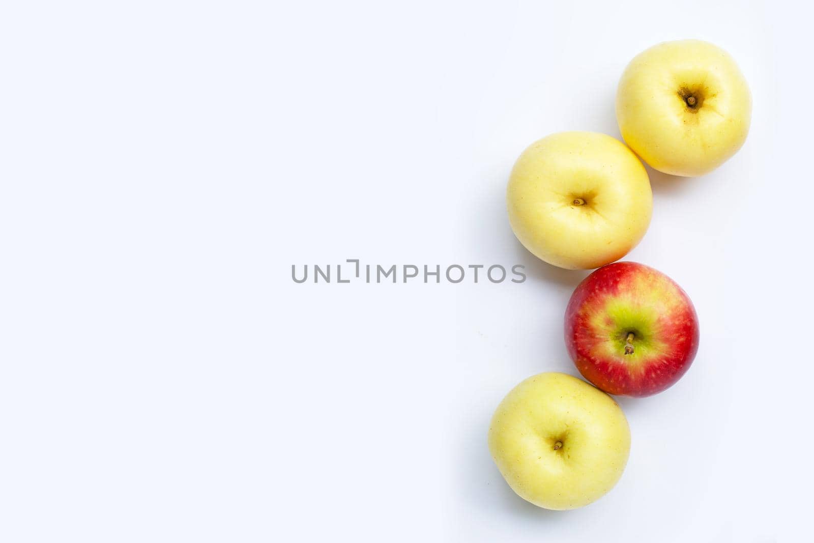 Juicy red and yellow apples on white background 
