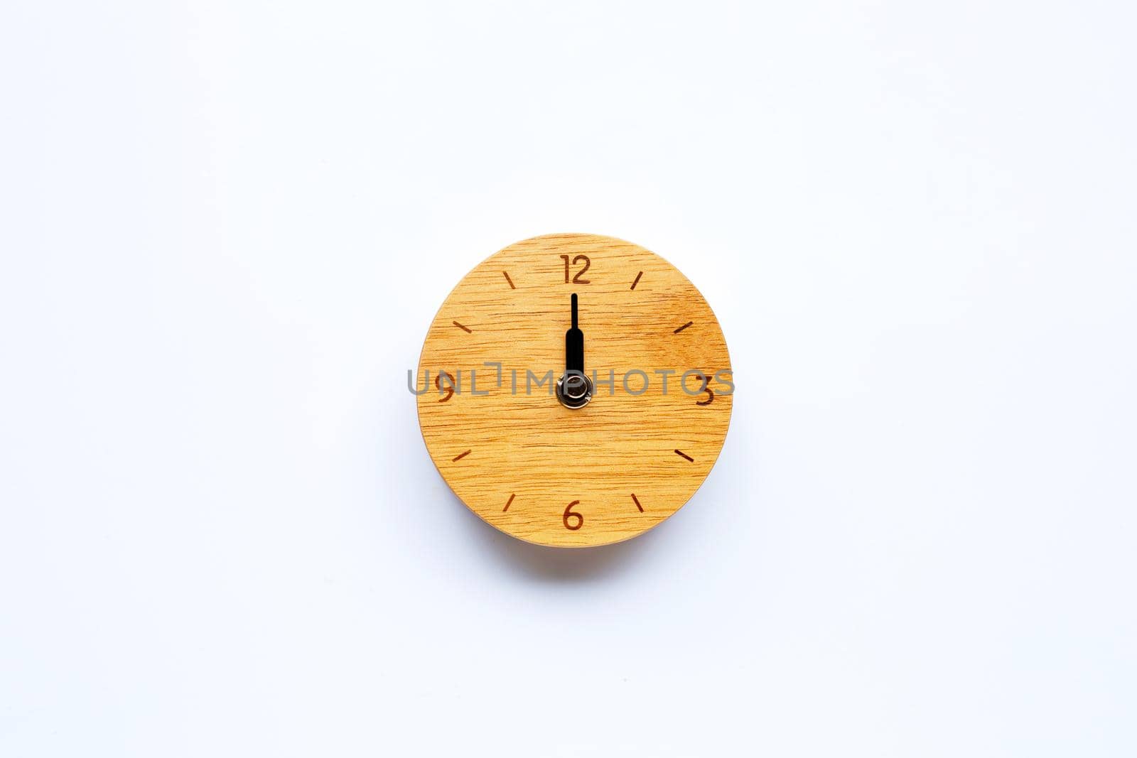 Wooden clock on white background. Copy space