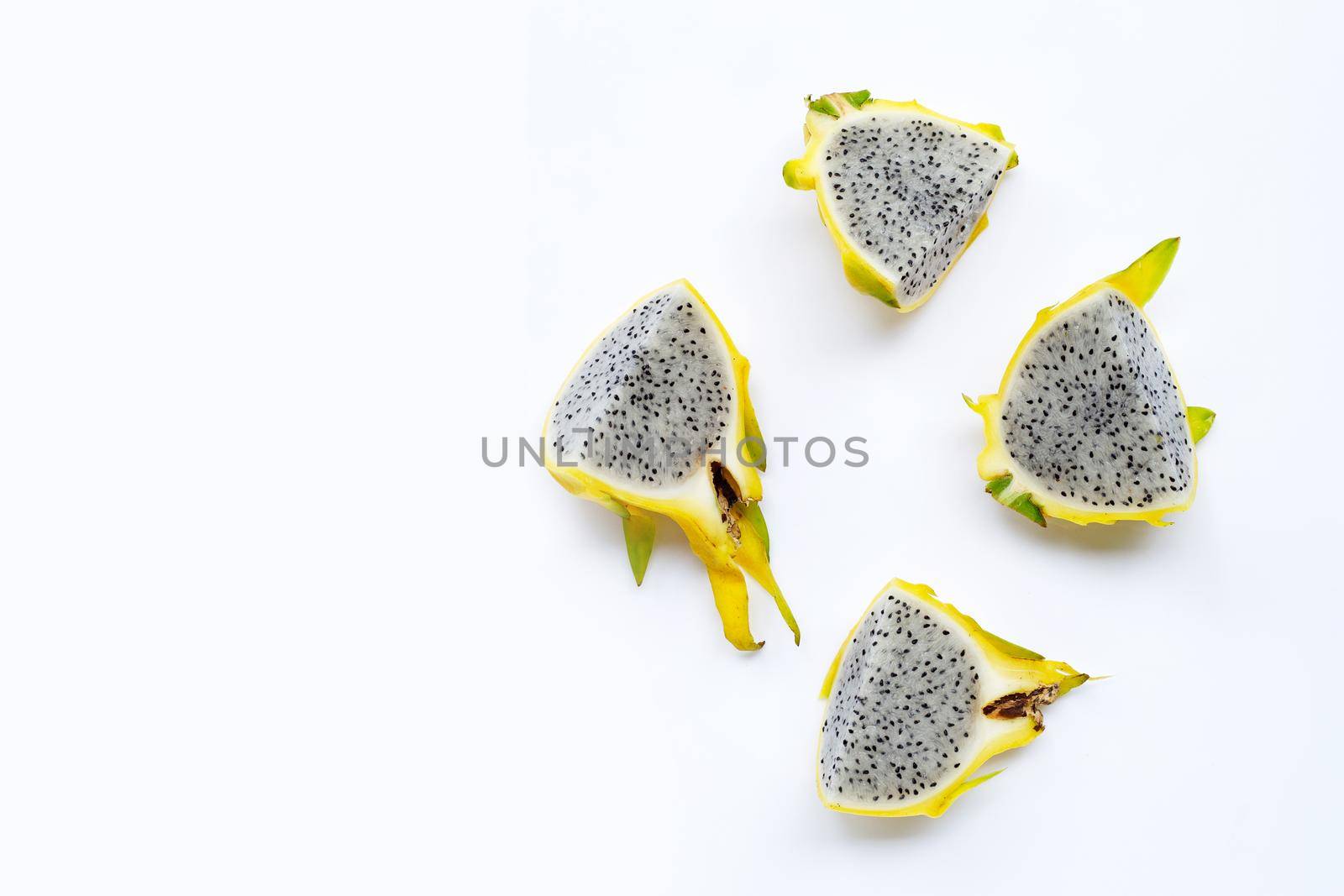 Yellow pitahaya or dragon fruit on white background. Copy space