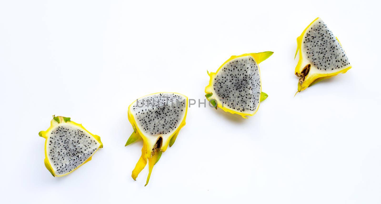 Yellow pitahaya or dragon fruit on white background. Copy space