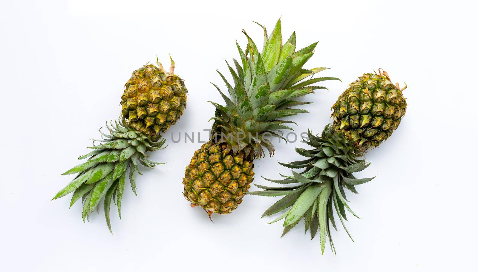 Pineapple on white background. Top view