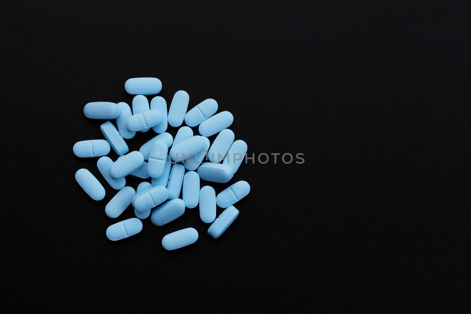 "PrEP" ( Pre-Exposure Prophylaxis). used to prevent HIV. Dark background. Copy space