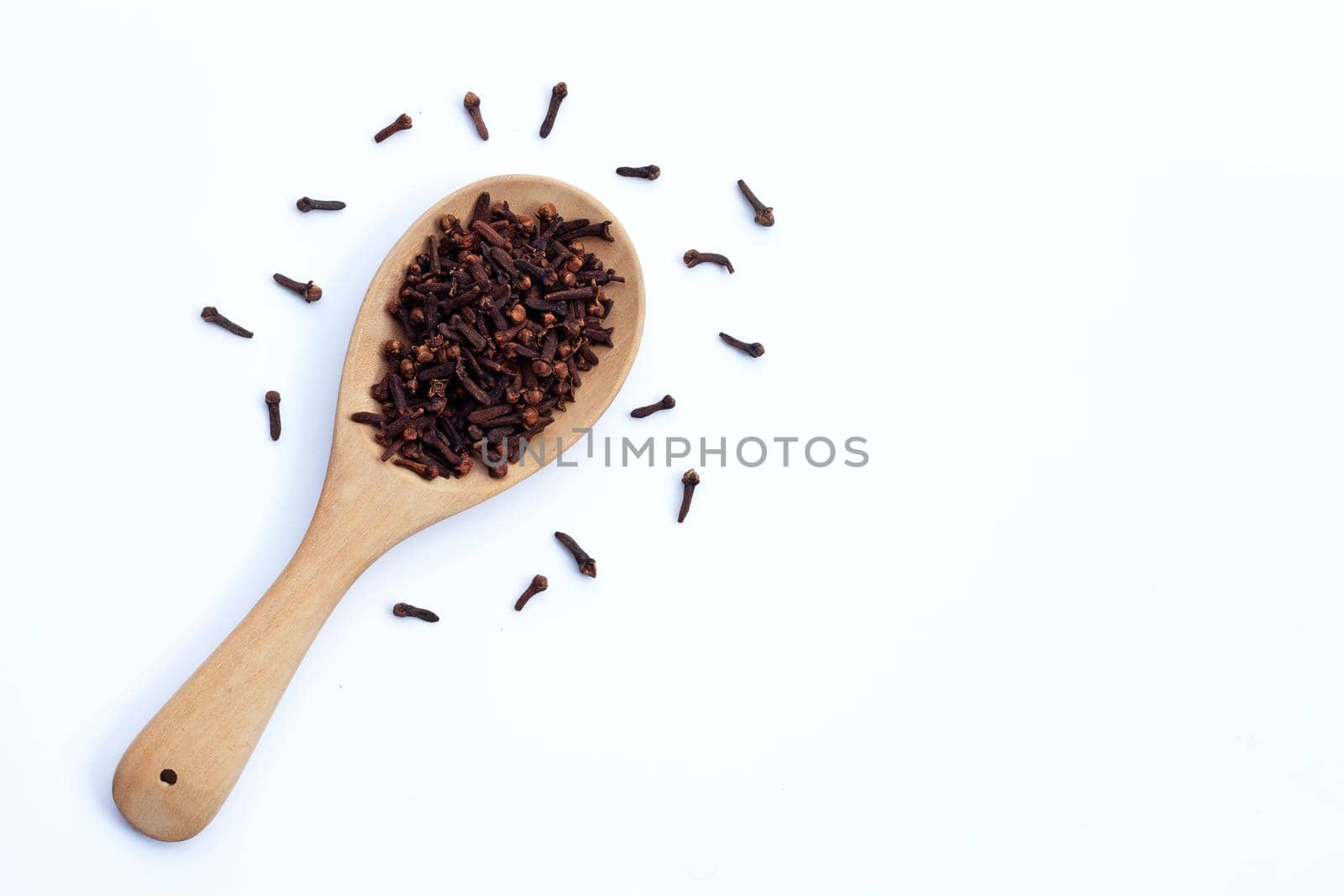 Spice dried cloves on white background.