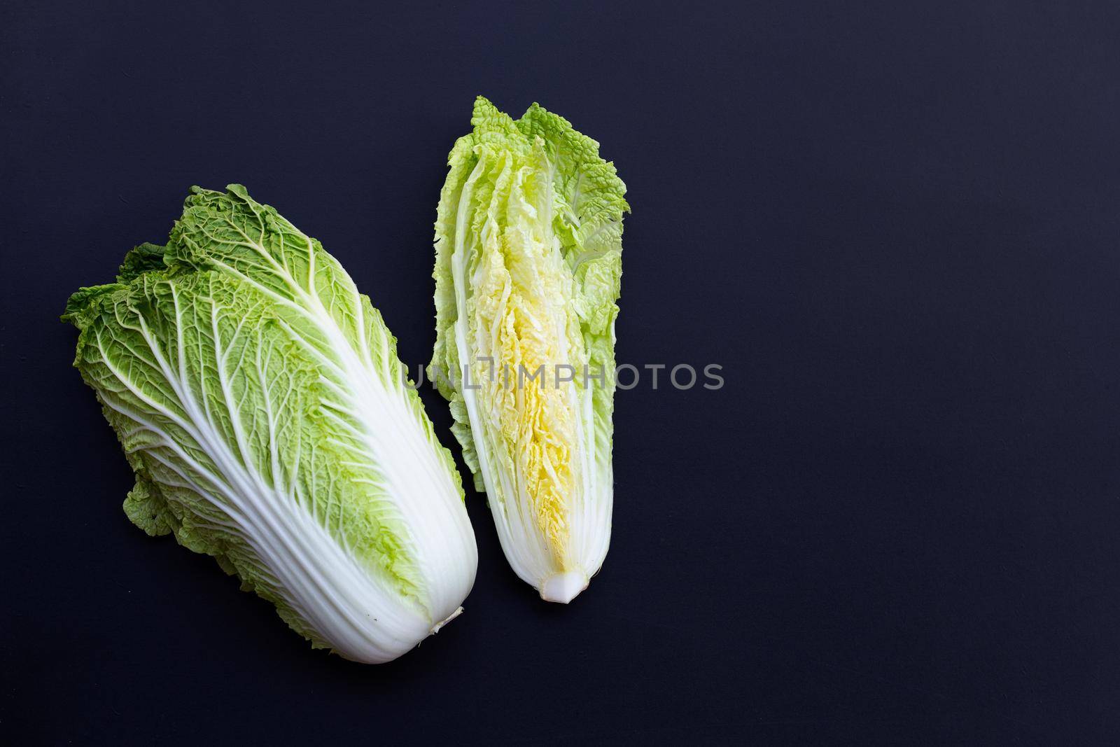 Chinese cabbage on dark background. Copy space