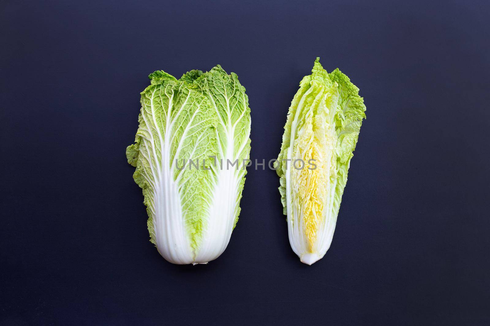 Chinese cabbage on dark background. Copy space