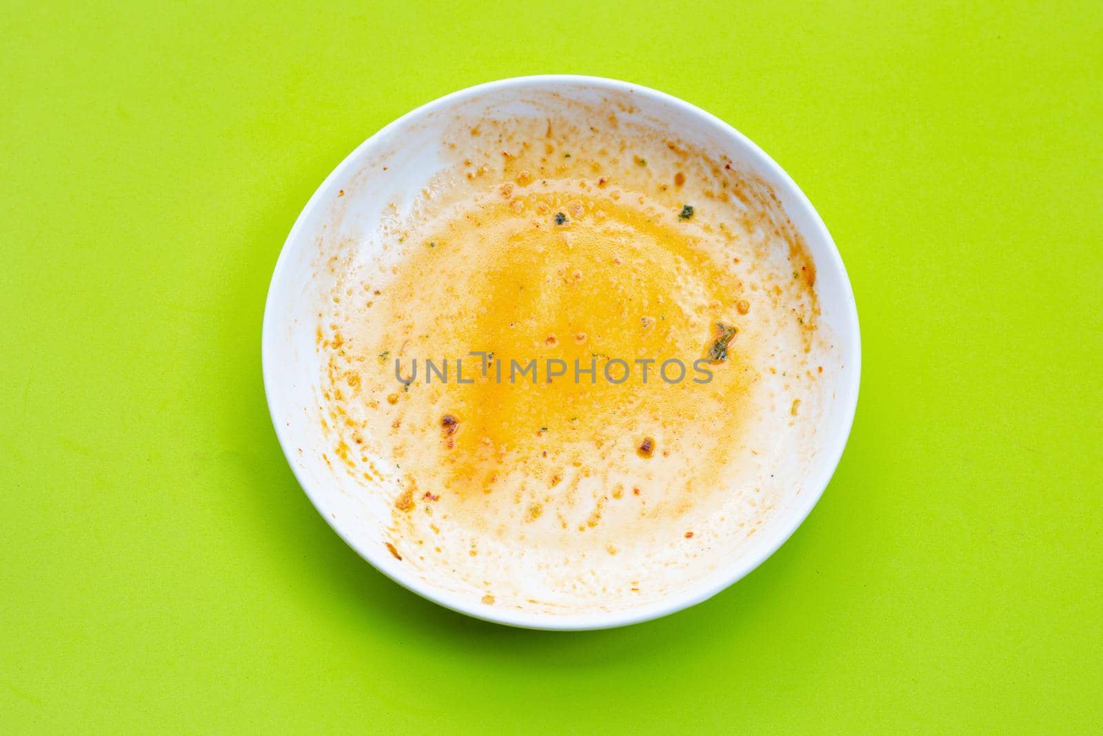 Dirty dishes on green background. Top view
