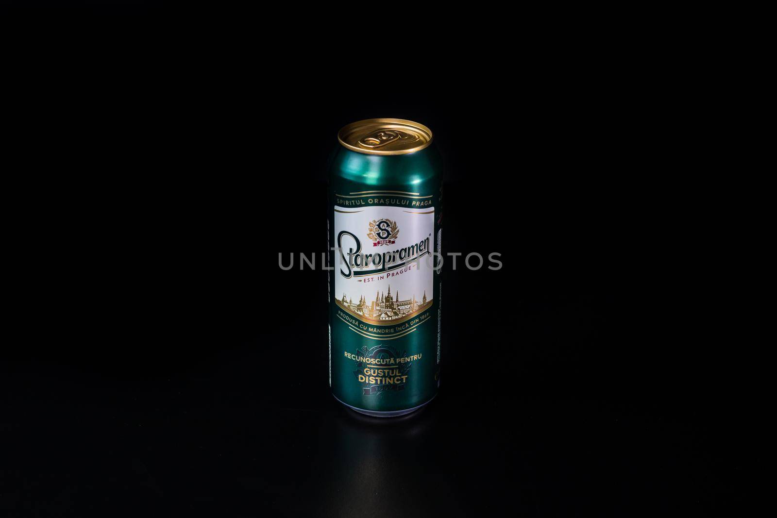 Staropramen  beer can isolated on black background. Bucharest, Romania, 2021