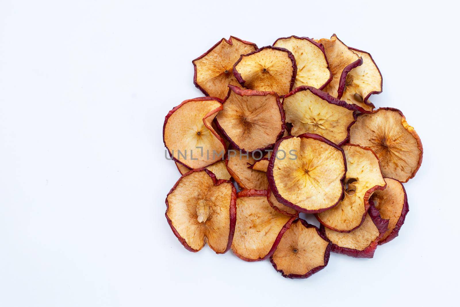 Dried apple slices on white background by Bowonpat