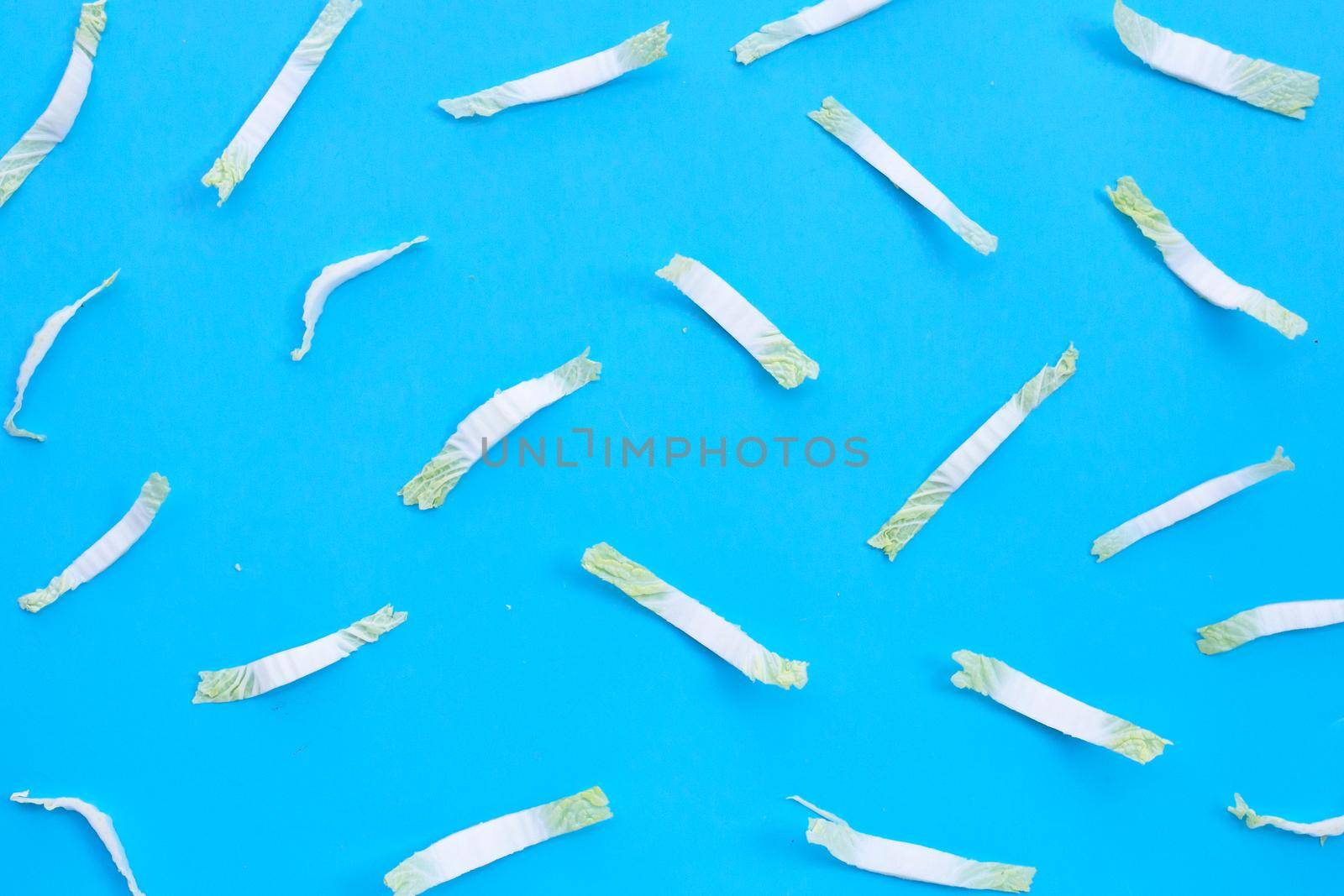 Chinese cabbage sliced on blue background