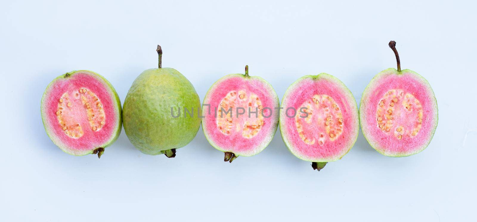 Pink guava on white background. by Bowonpat