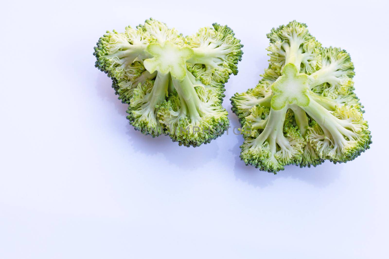 Fresh green broccoli on white background.