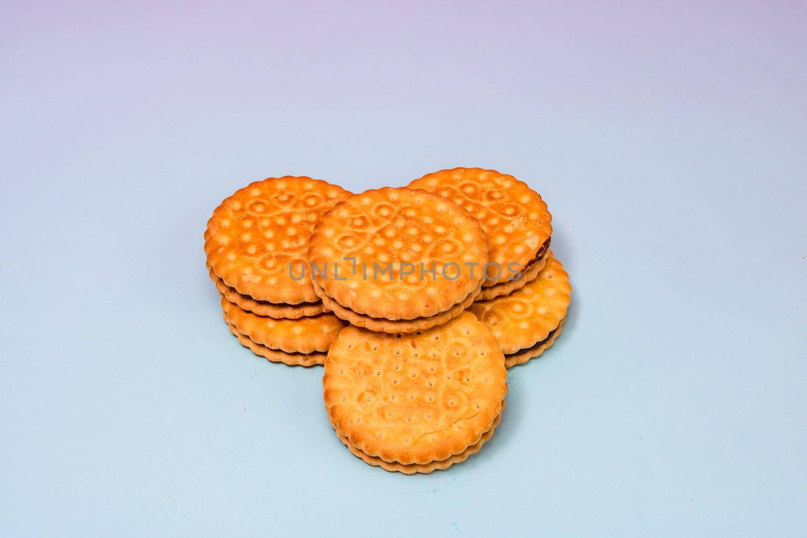 Round biscuits with chocolate cream, sandwich biscuits with chocolate filling isolated.