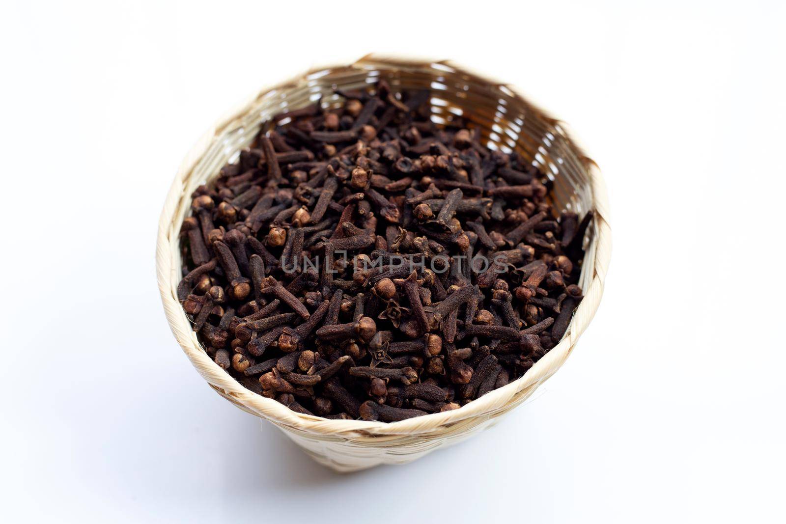 Spice dried cloves on white background.