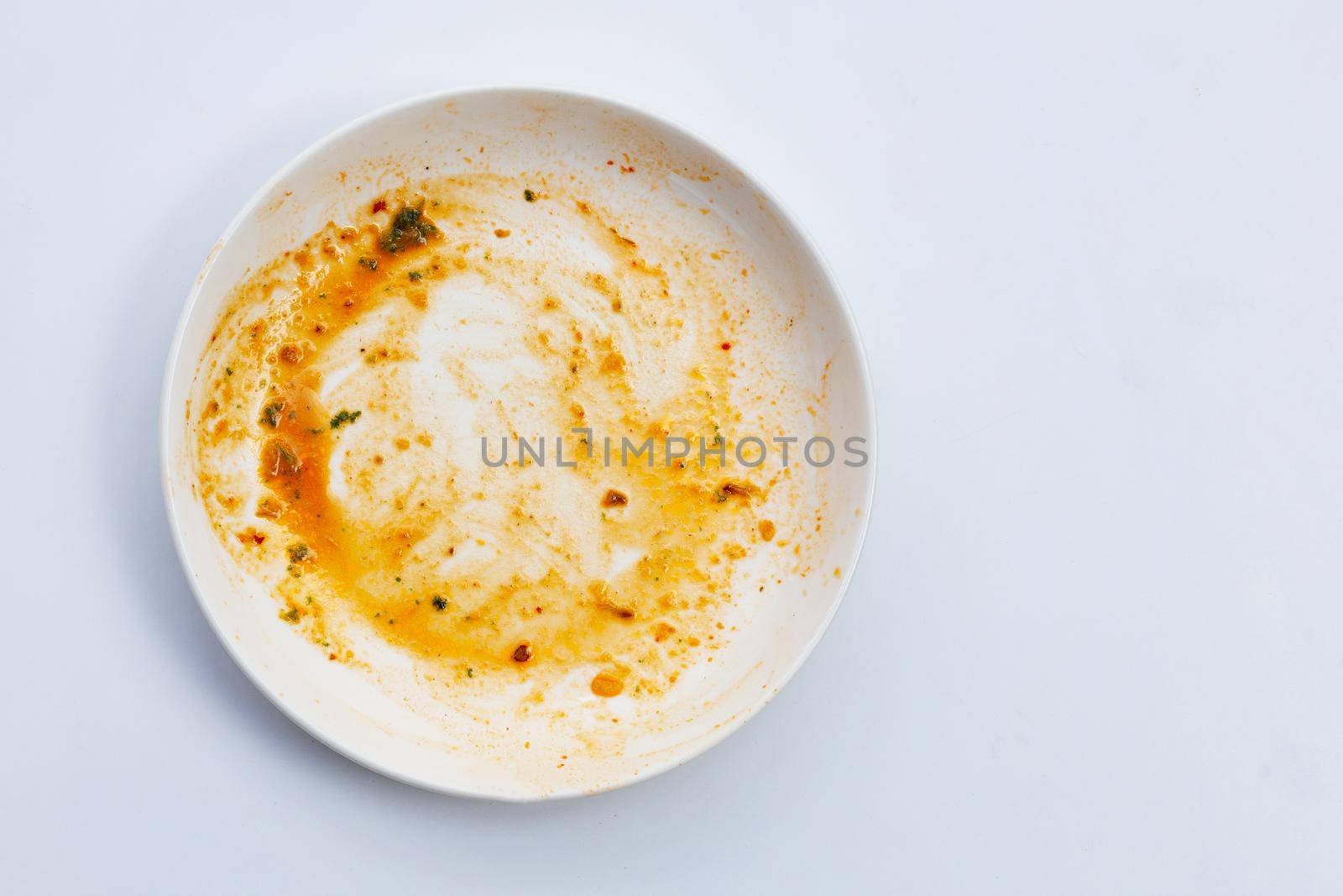 Dirty dish on white background. Top view