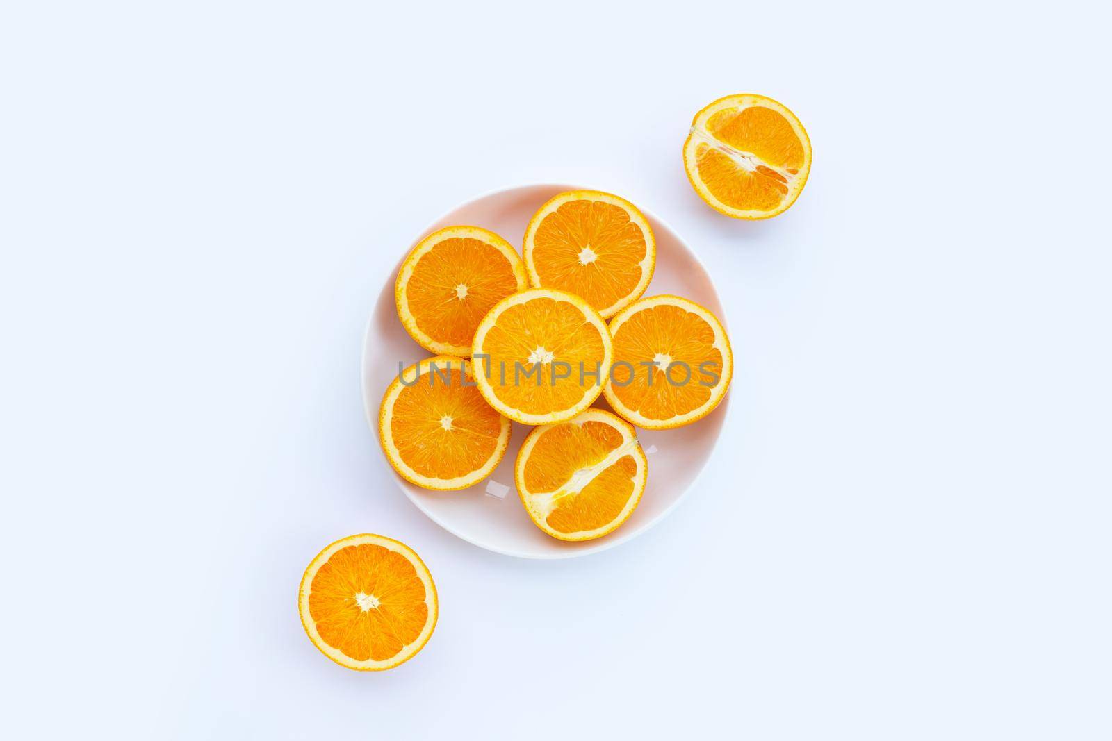 Sliced oranges on white background. High vitamin C, Juicy and sweet.