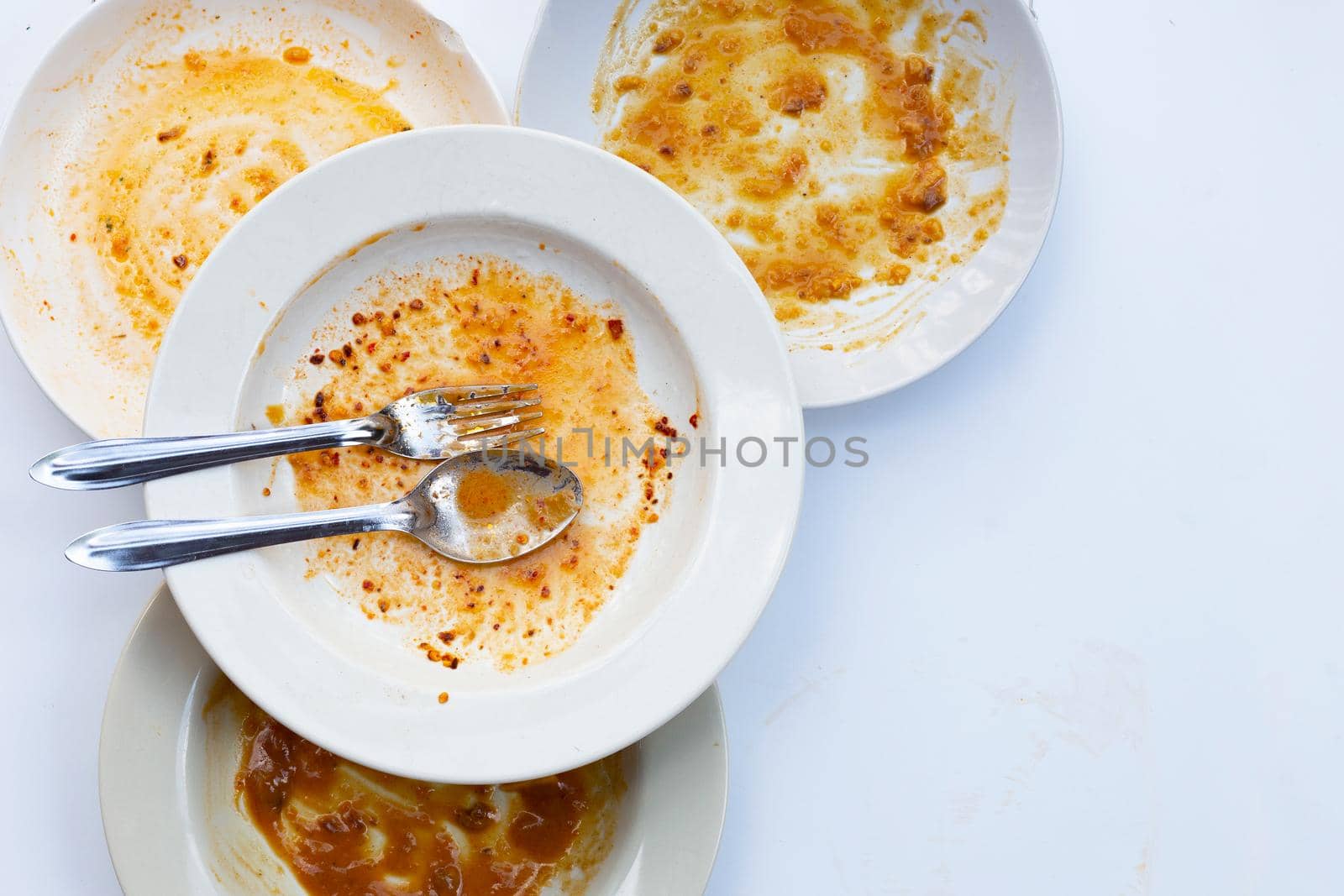 Dirty dishes on white background. Top view