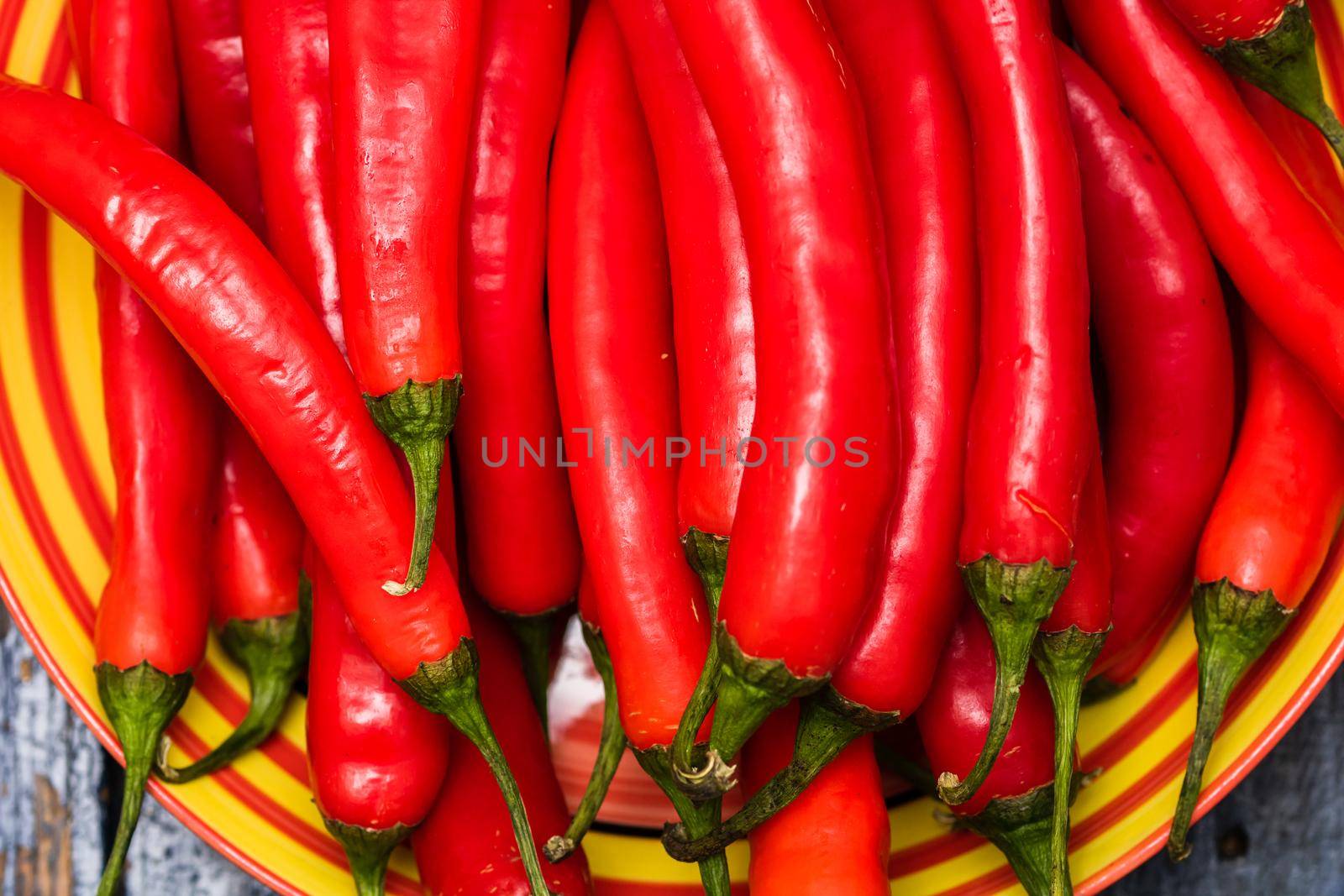 Red hot chilli peppers, close up. Background of red chilies