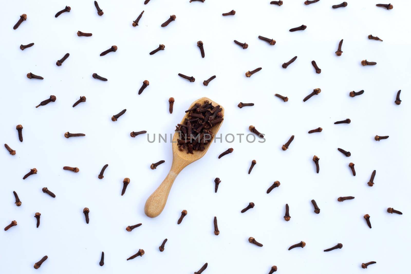 Spice dried cloves on white background. by Bowonpat