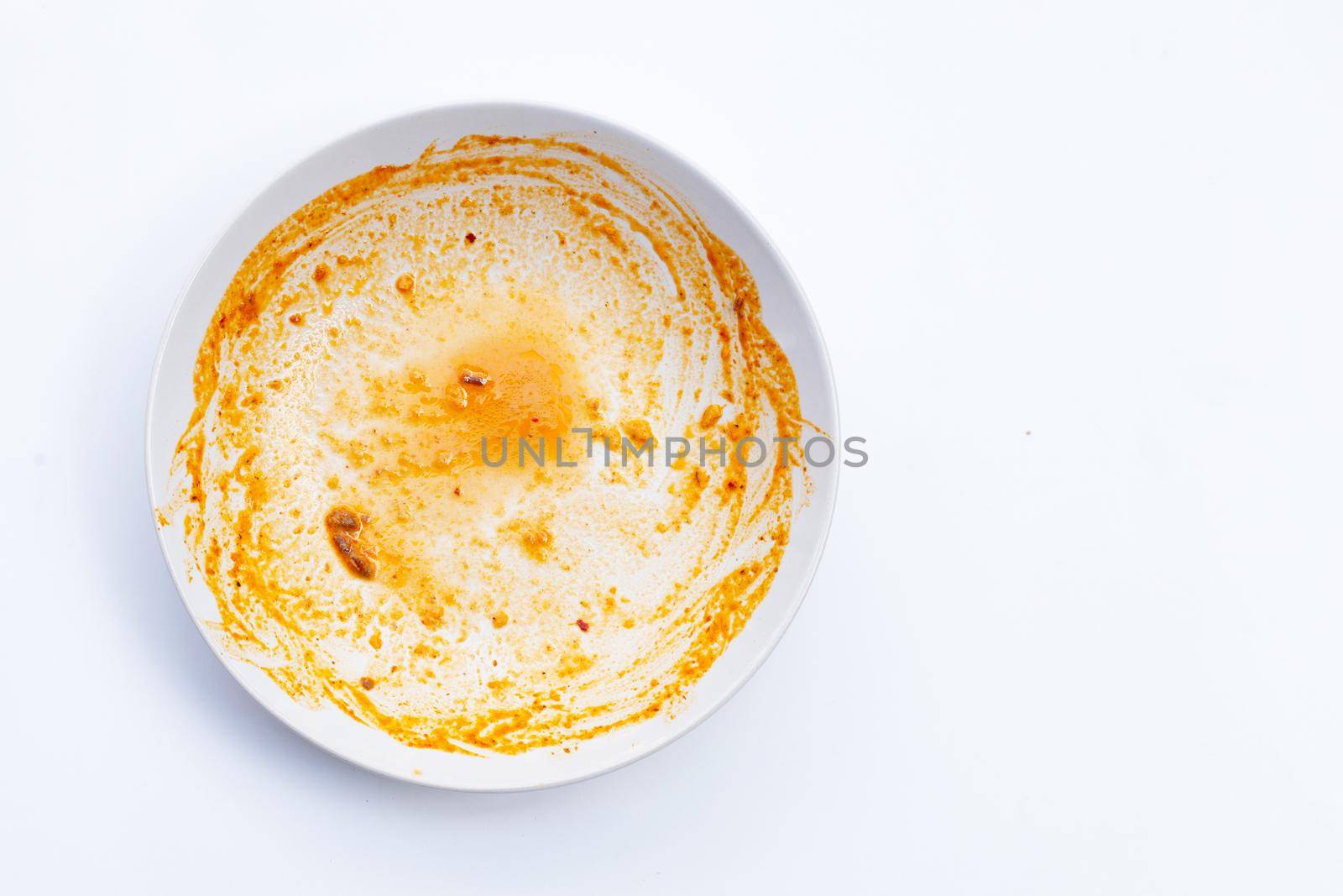 Dirty dish on white background. Top view