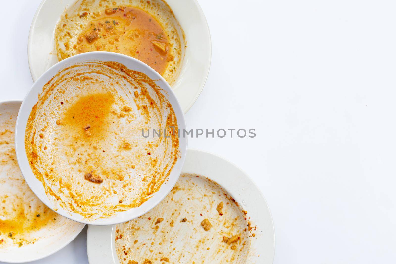 Dirty dishes on white background. Top view by Bowonpat