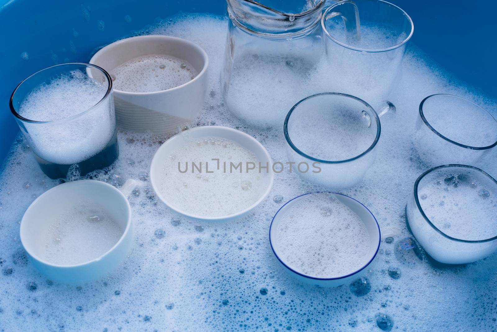 Washing used drinking glasses and cups