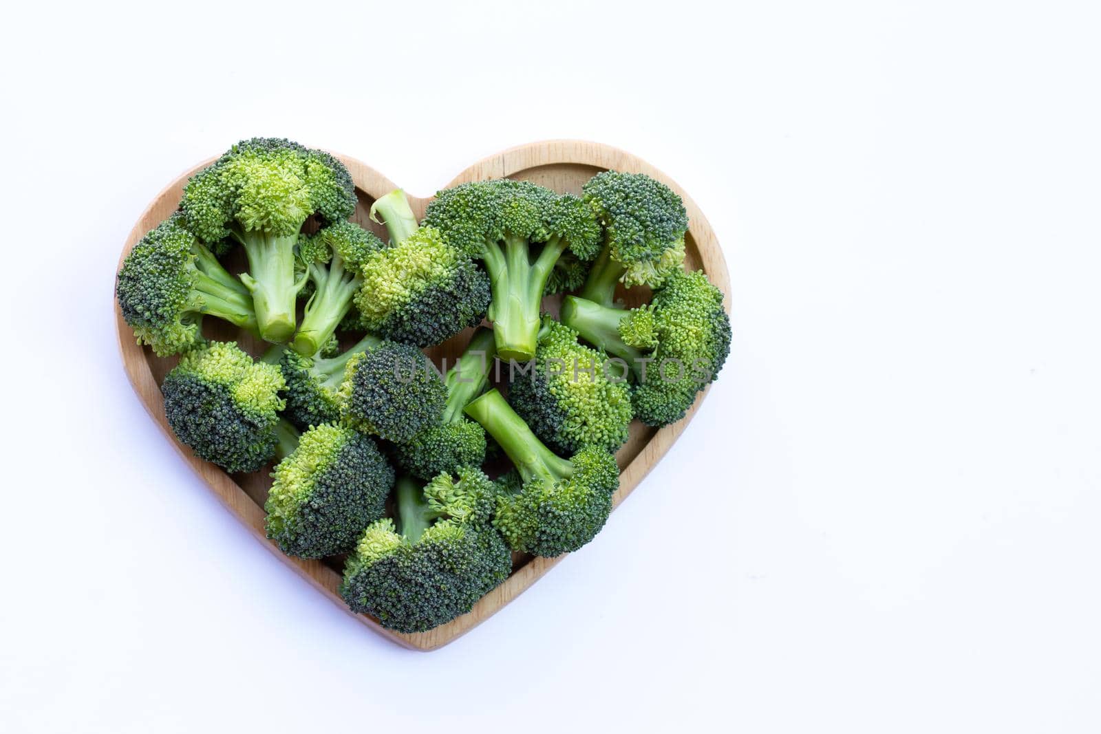 Fresh green broccoli on white background. by Bowonpat