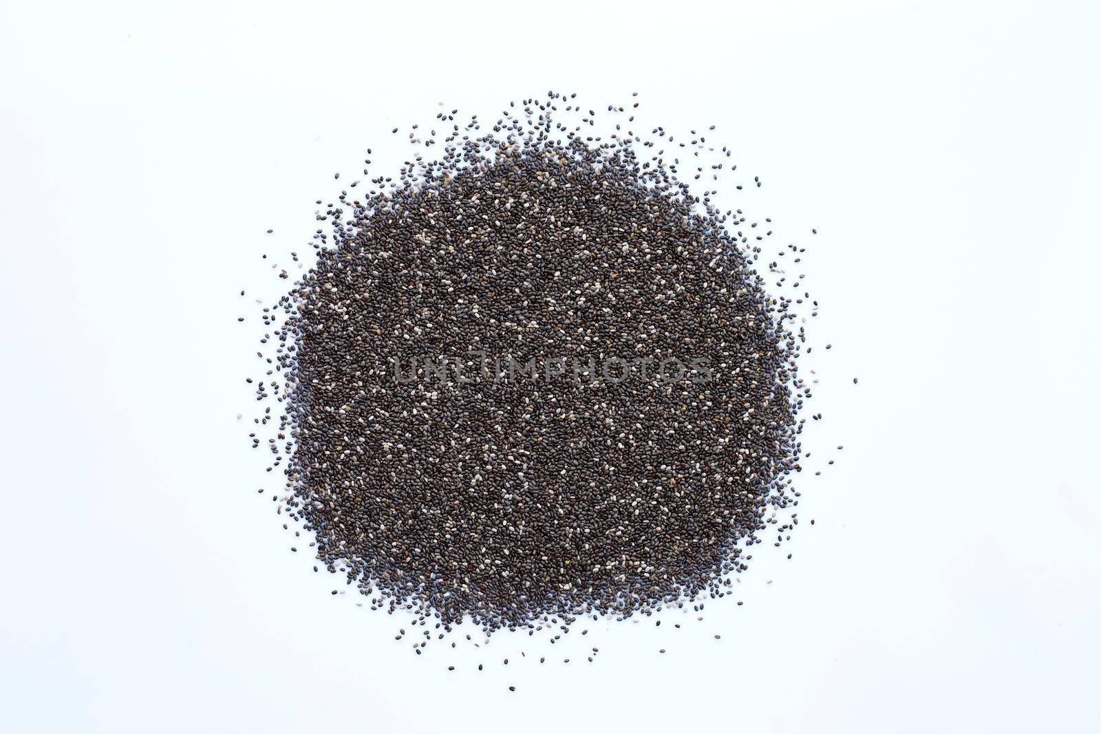 Chia seeds isolated on white background. by Bowonpat