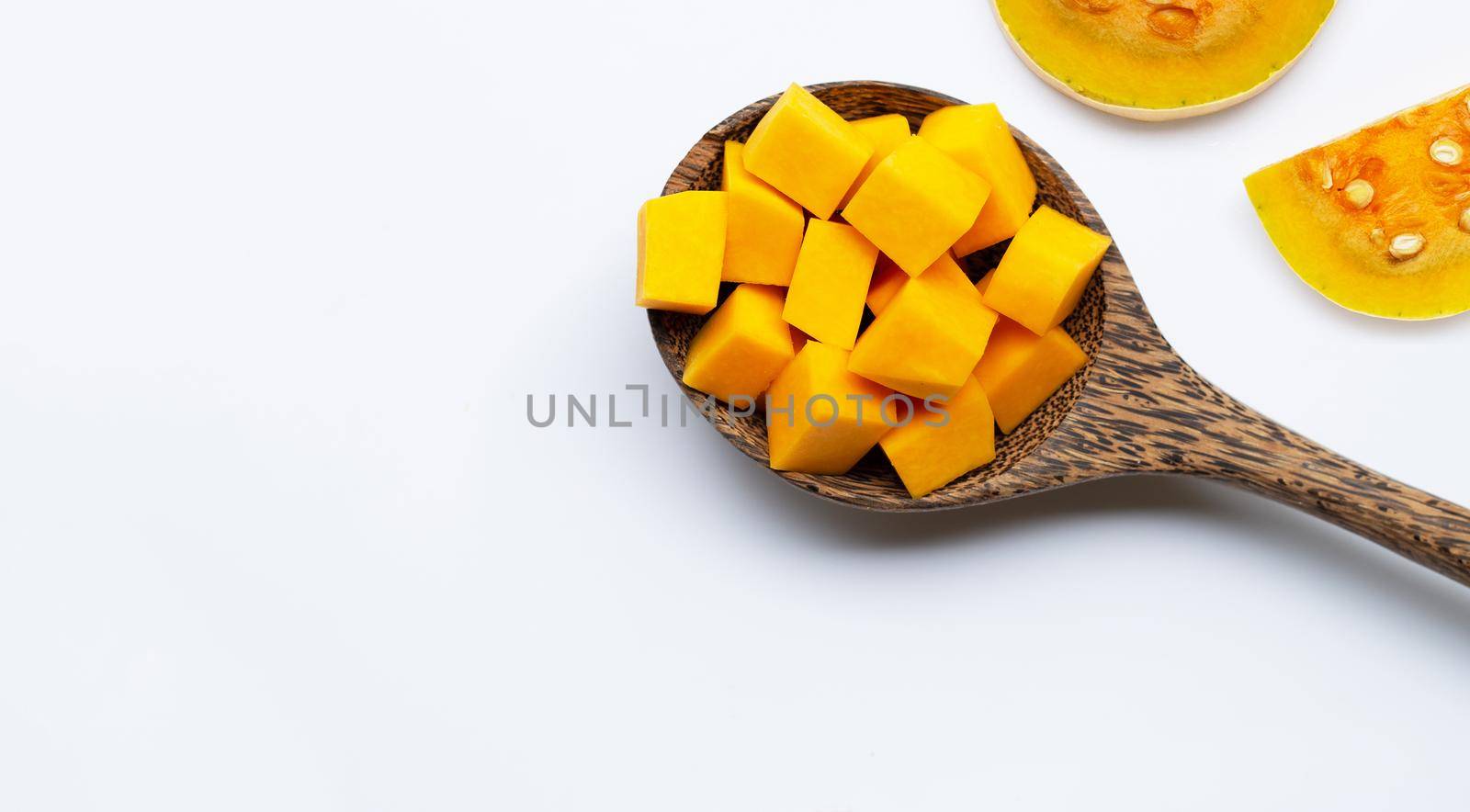 Cut and slices butternut squash on white background. by Bowonpat