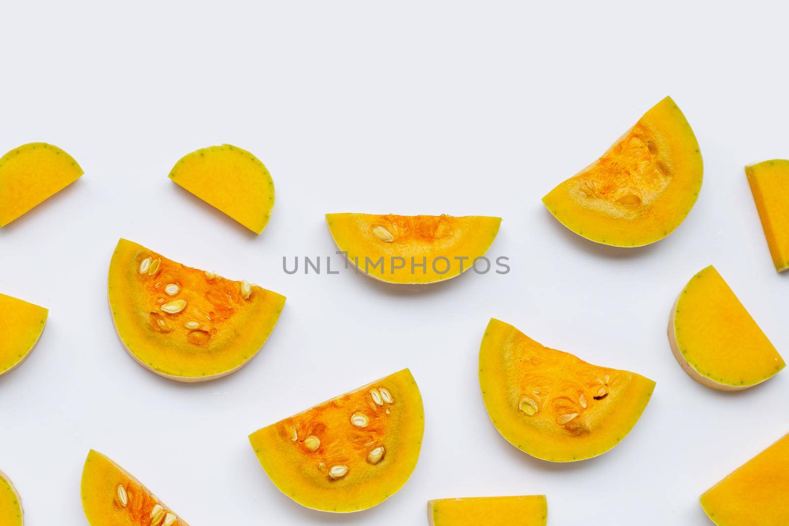 Cut and slices butternut squash on white background. by Bowonpat