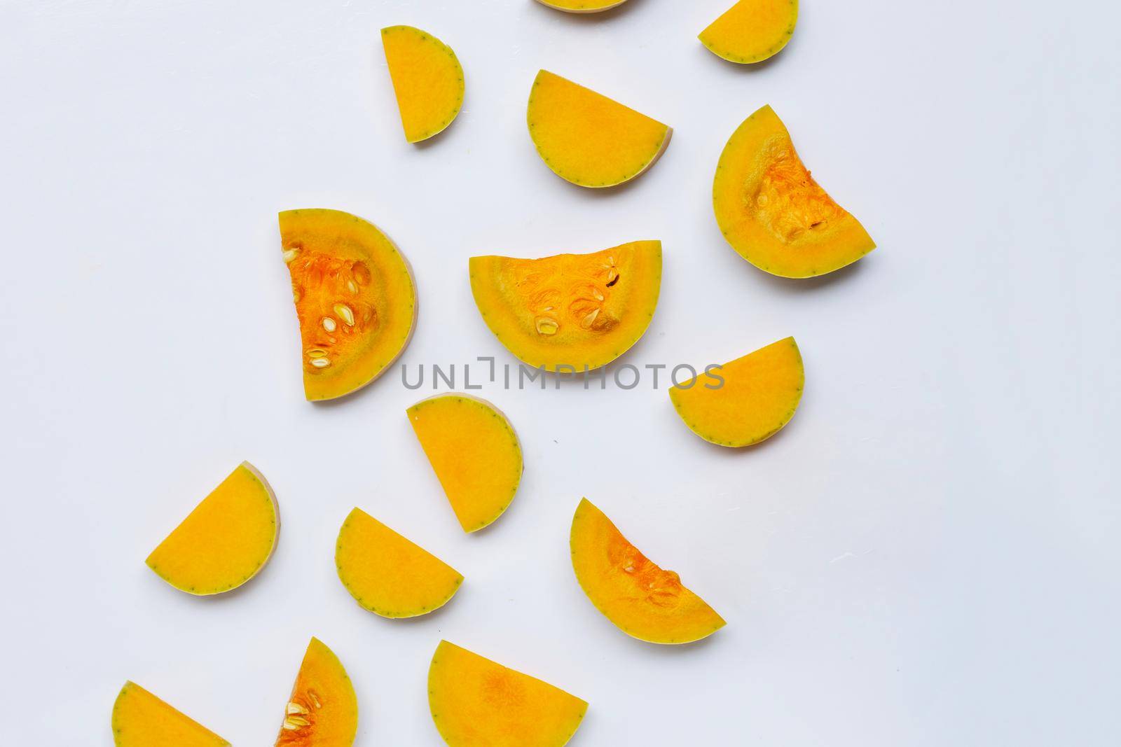 Cut and slices butternut squash on white background. by Bowonpat