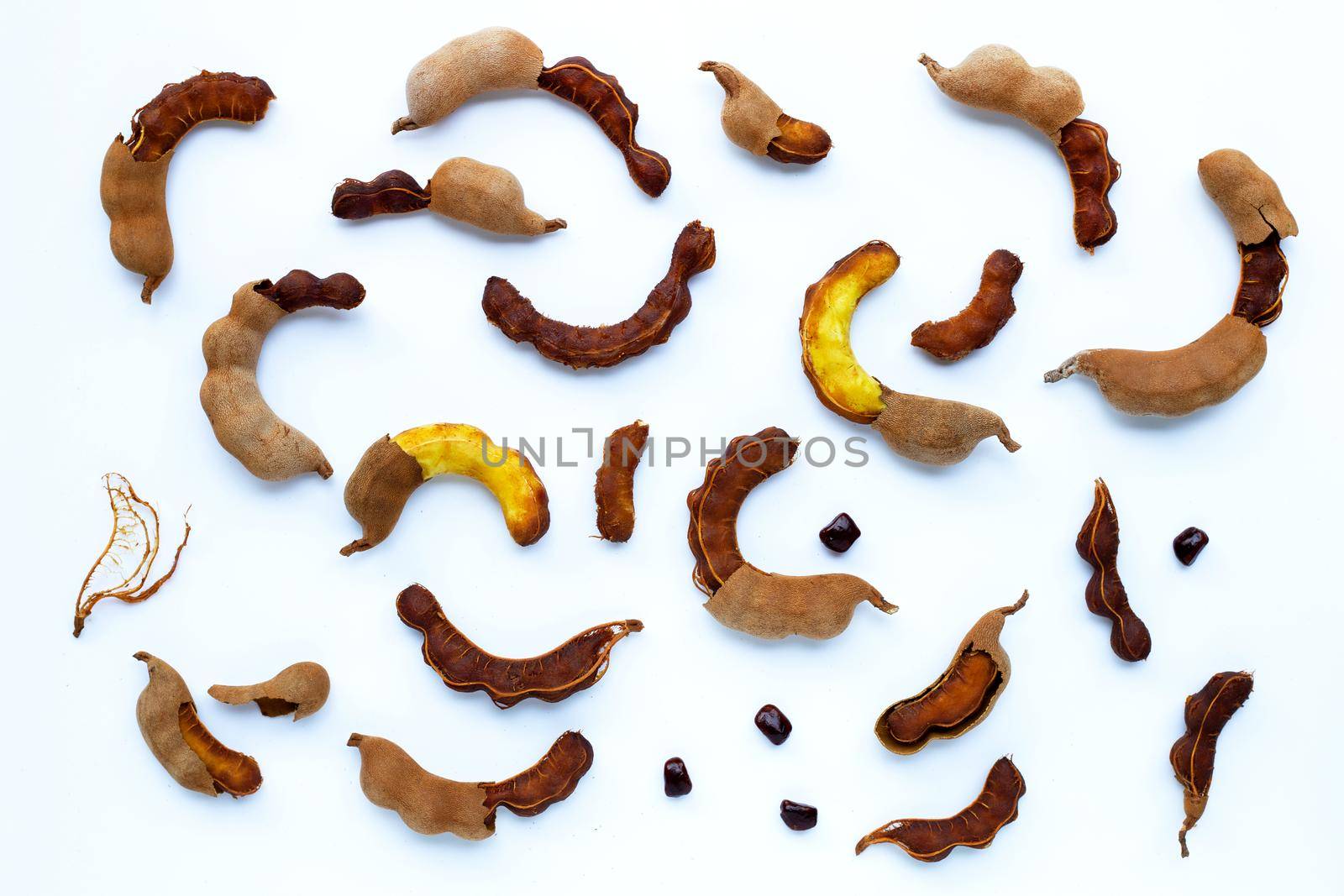 Tamarind tropical fruit on white background. Top view