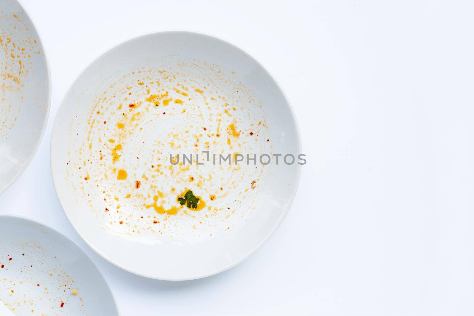 Dirty dish on white background. Top view