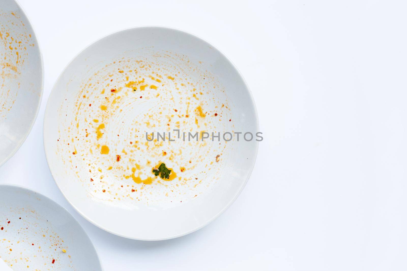 Dirty dish on white background. by Bowonpat