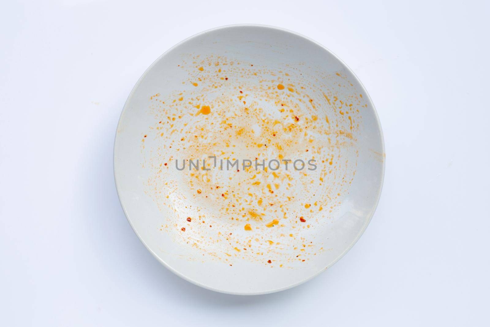 Dirty dish on white background. by Bowonpat