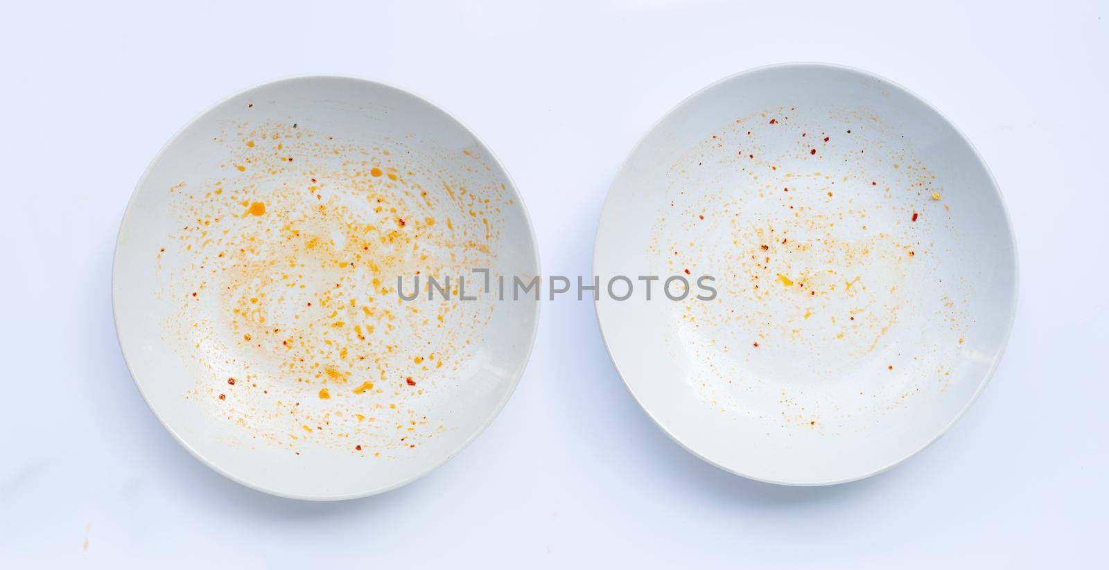 Dirty dish on white background. by Bowonpat