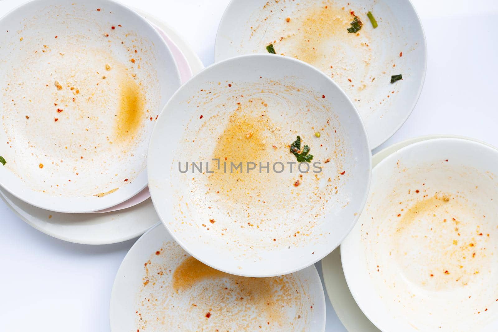 Dirty dishes on white background.