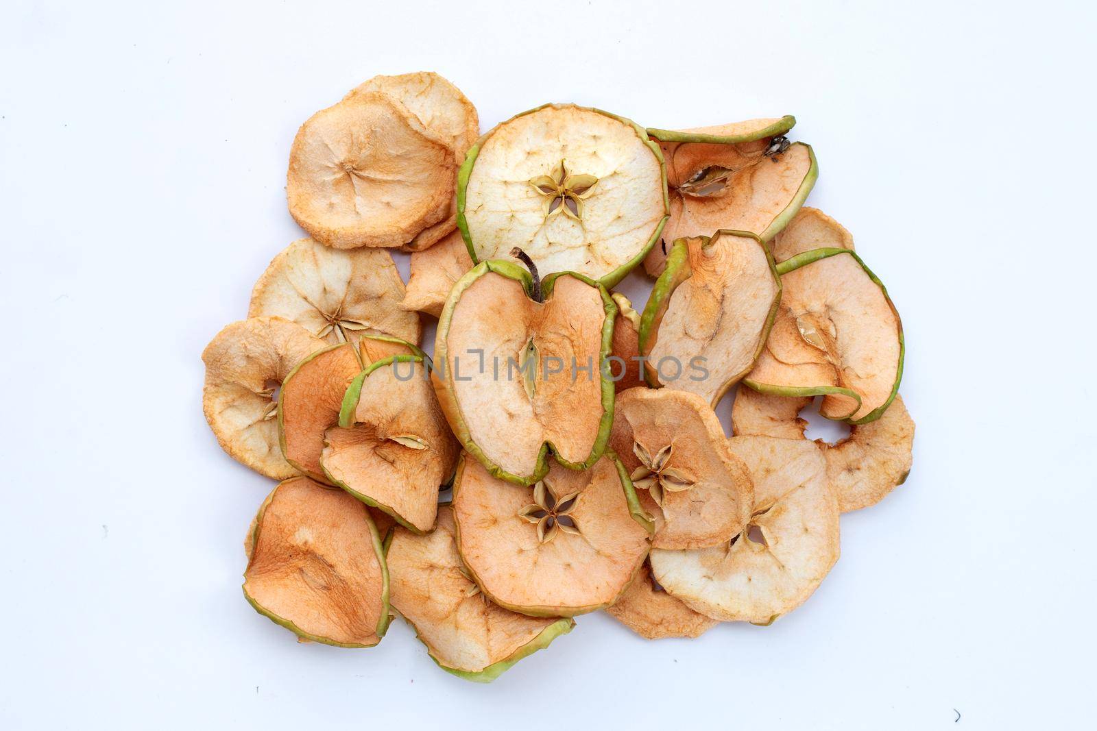 Dried apple slices on white background by Bowonpat