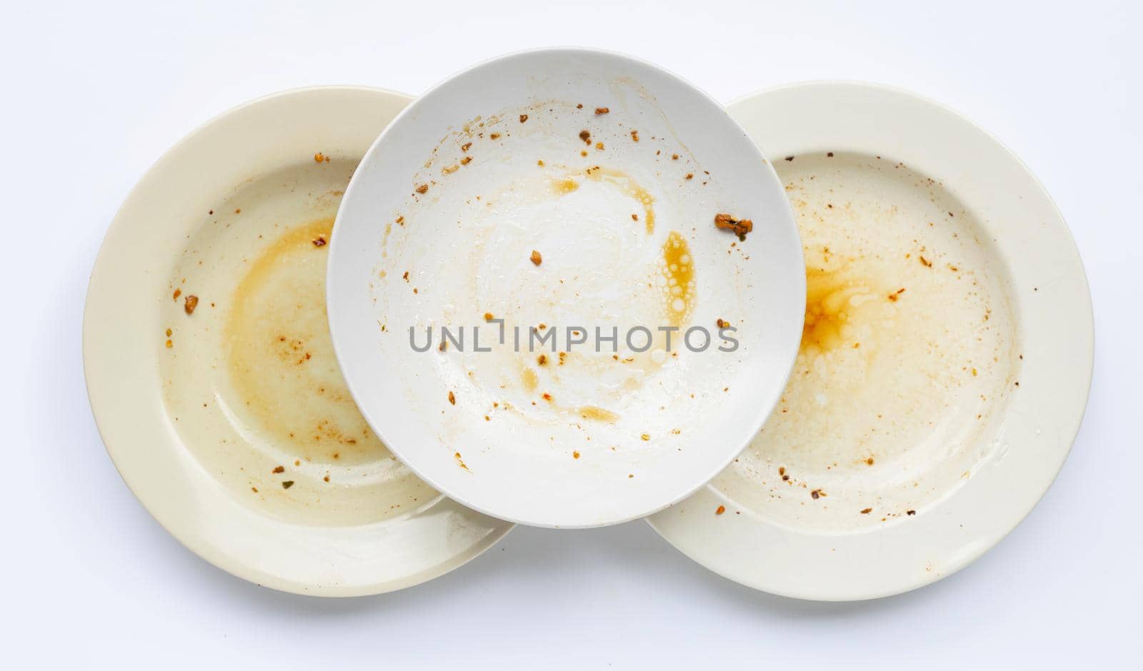 Dirty dishes on white background.