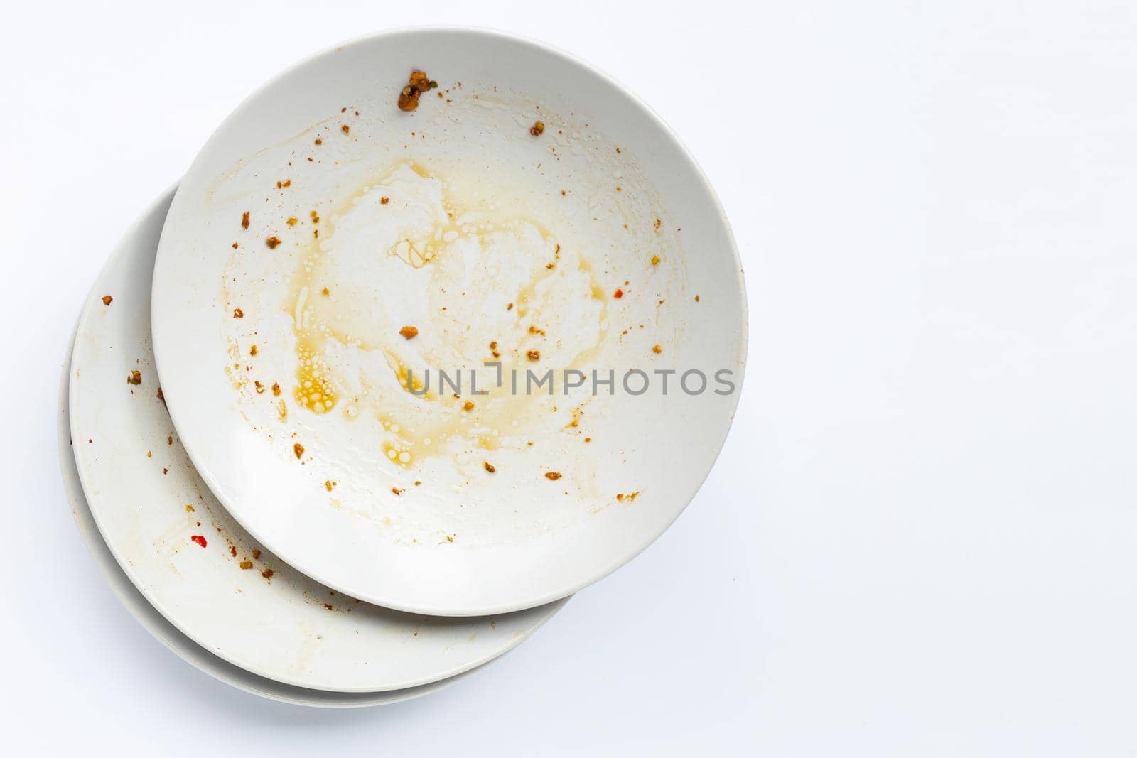 Dirty dishes on white background.