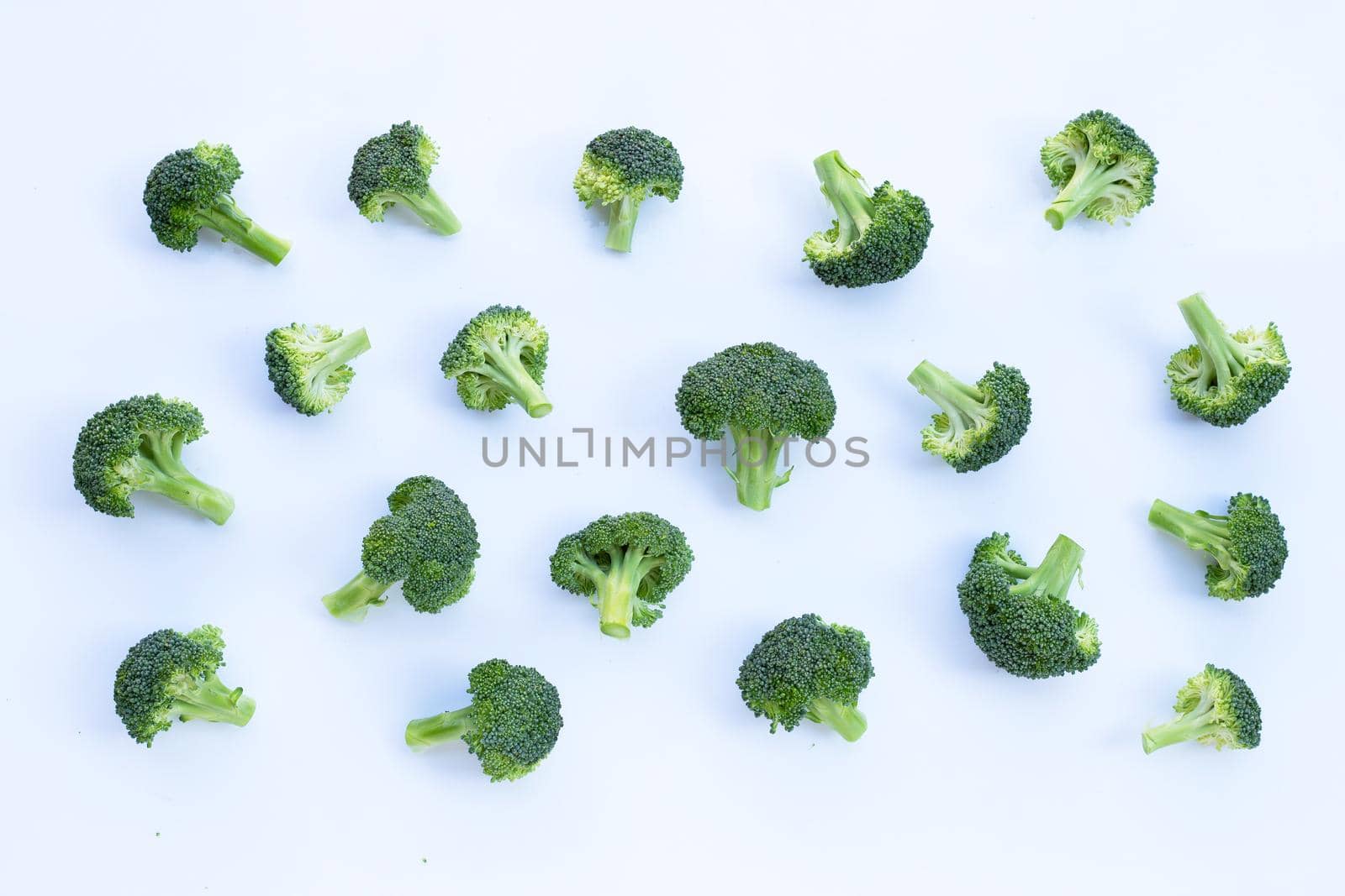 Fresh green broccoli on white background.