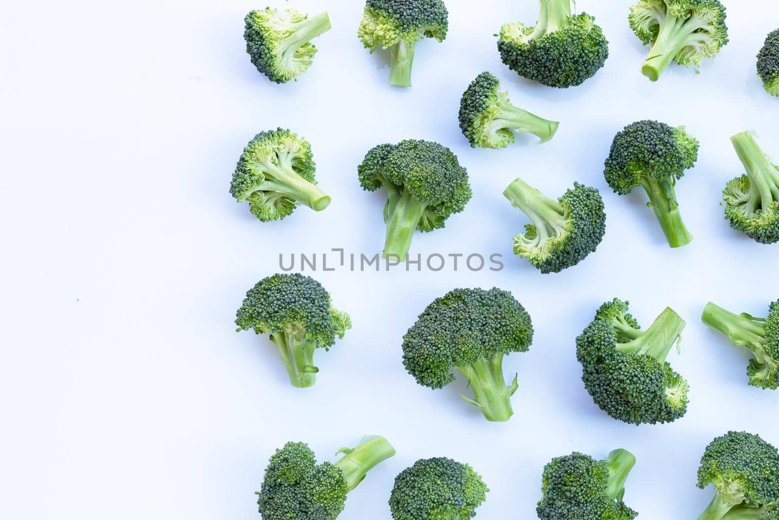 Fresh green broccoli on white background.