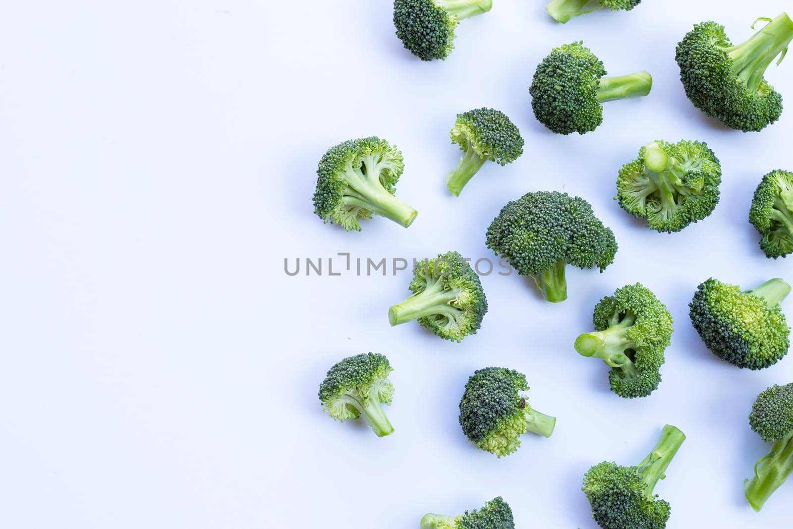 Fresh green broccoli on white background.