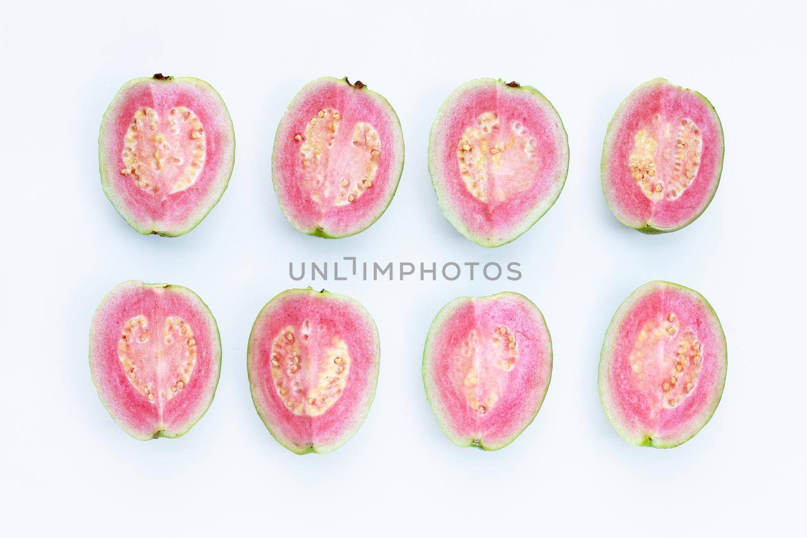 Pink guava on white background. by Bowonpat