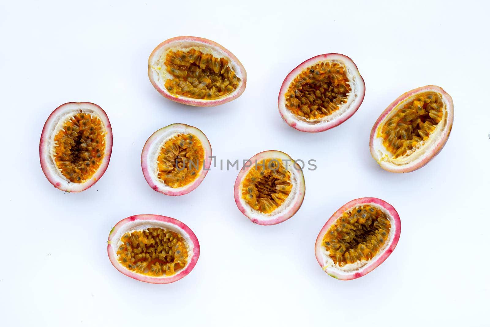 Passion fruit on white background. Top view by Bowonpat