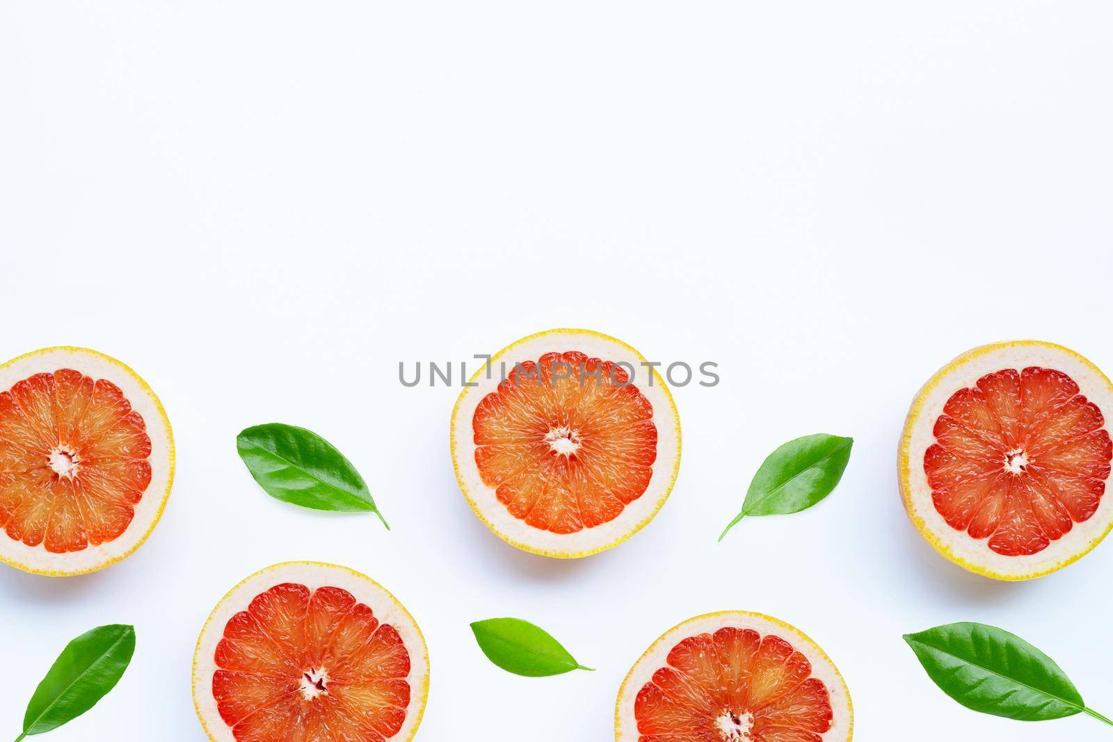 High vitamin C. Juicy grapefruit on white background.