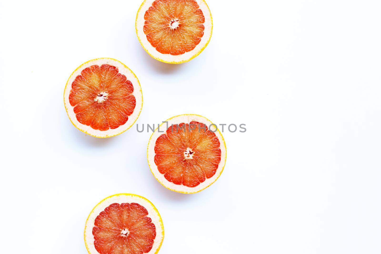 High vitamin C. Juicy grapefruit on white background.