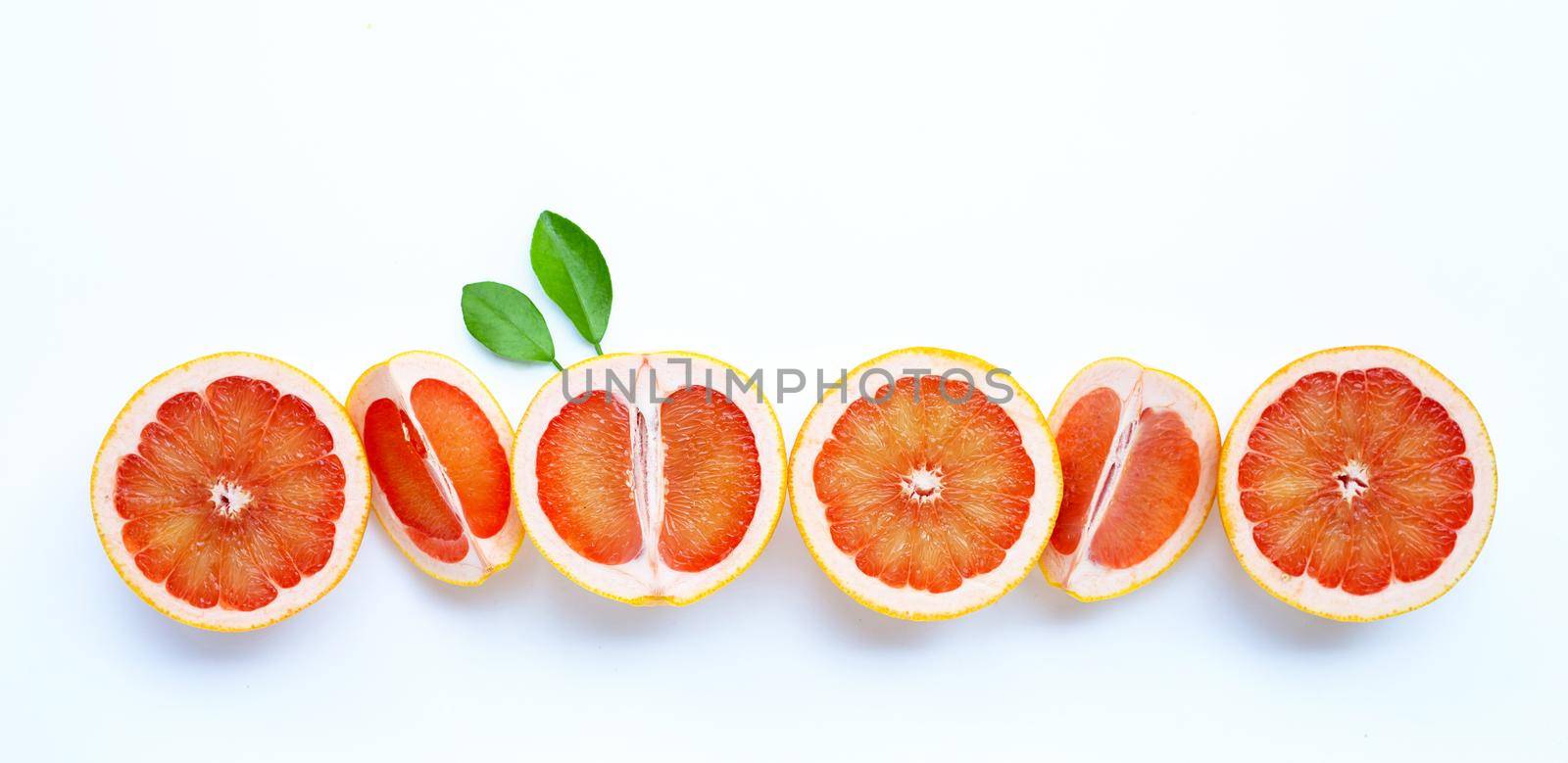 High vitamin C. Juicy grapefruit on white.  by Bowonpat