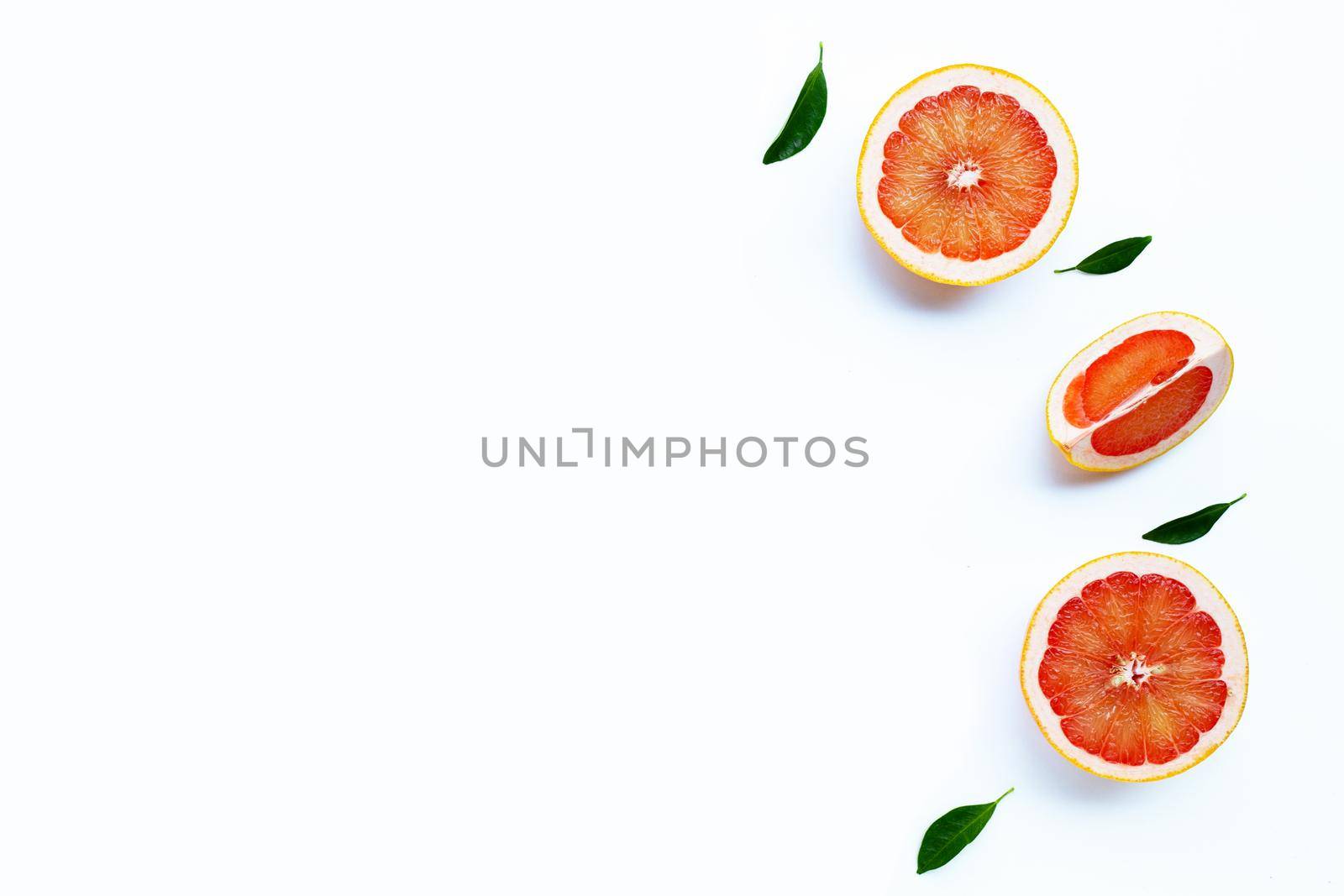 High vitamin C. Juicy grapefruit on white background.