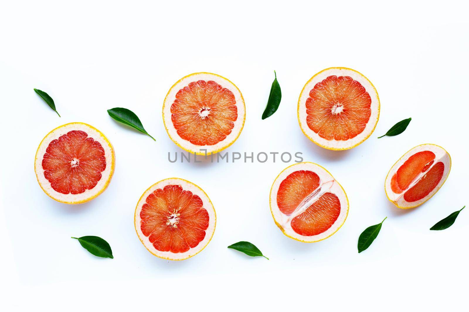 High vitamin C. Juicy grapefruit on white background.